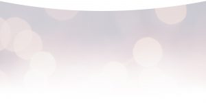 Soft pastel pink and blue background.