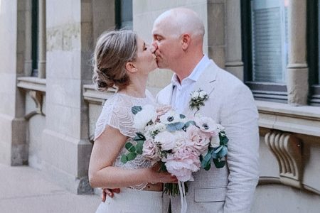 Newlyweds kissing